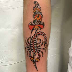 Scorpion tattoo with dagger by Mikel Edorta Lopez de Vicuna #taitattoos #scorpion #dagger #traditional