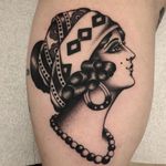 Lady head tattoo by Vince Pages #VincePages #ladytattoos #blackandgrey #traditional #gypsy #ladyhead #portrait #jewelry #scarf #bandana #pattern #folktraditional