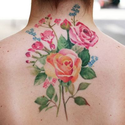 Rose tattoo by Thommesen ink #ThommesenInk #rosetattoos #color #watercolor #painterly #flowers #floral #rose #rosebud #leaves #nature #plant