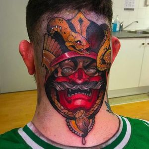 OUCH. Awesome looking Japanese style head tattoo by Joe Frost #snake #mask #JapaneseStyle #japanesetattoo #JoeFrost #neotraditional #snaketattoo #headtattoo #head