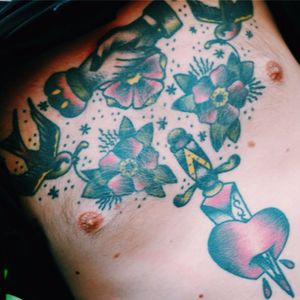 Traditional chest piece by Karl Blom #tudorrose #rose #traditional #swallow #shakinghands #daggerheart #dagger #heart #StreetStyle #TattooStreetStyle #trailerparkfestival #karlblom