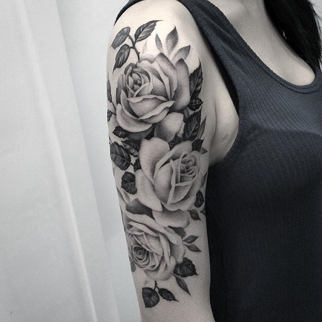 Negative space roses and triangle tattoo  Tattoogridnet