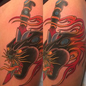 Panther head tattoo by Chris Nunez #ChrisNunez #color #traditional #panther #cat #junglecat #sword #knife #death #fire #blood #surreal