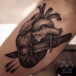 Awesome tattoo done by #MonkeyBob #black #heart #knife #sharp