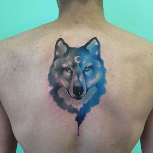 Soft, inky watercolor wolf tattoo by Florencia Gonzalez Tizon. #watercolor #FlorenciaGonzalezTizon #wolf #nooutline