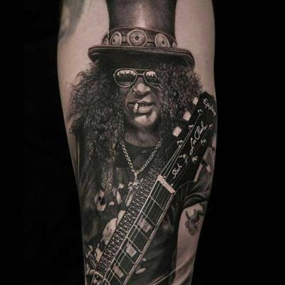 Slash tattoo by Meyer Viktor #MeyerViktor #musictattoos #blackandgrey #realism #realistic #hyperrealism #portrait #Slash #GunsNRoses #guitar #tophat #smoking #famous #music #rockandroll #tattoooftheday