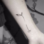 Minimalistic sprout tattoo by Stella Luo #StellaLuo #fineline #blackandgrey #linework #small #minimalistic #sprout