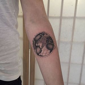 Classic modern design, globe tattoo by Alex Wheeldon. #AlexWheeldon #globe #globetattoo #blackandgrey