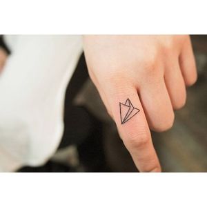 Paperplane on finger by Needle Art Tattoo #Paperplane #microtattoo #fingertattoo #NeedleArtTattoo