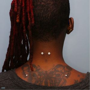 Flaunt that sexy back of your neck with a pretty bejewelled piercing #nape #piercing