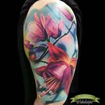 Bright and colorful realism magnolia half sleeve by Luka Lajoie. #magnolia #flower #realism #colorealism #LukaLajoie