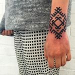 Simple yet rad top of the wrist tattoo done by Brody Polinsky. #BrodyPolinsky #UNIV_ERSE #blacktattoos #patterntattoo #blackwork