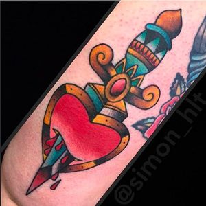 Beautiful dagger through the heart. Tattoo by SImon Blay. #SimonBlay #TLCtattoo #TraditionalLondonClan #boldtattoos #dagger #heart