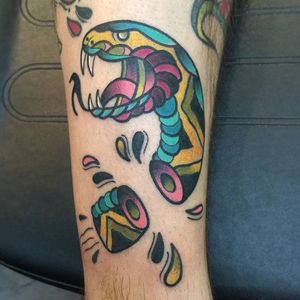 Snake Head Tattoo by Nick Stambaugh #snakehead #snakeheadtattoo #traditonal #traditionaltattoo #brighttattoos #neon #neontattoo #colorful #quirky #creativetattoos #NickStambaugh