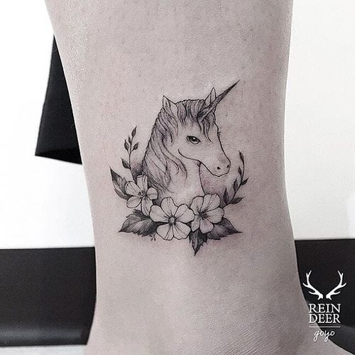 Unicorn tattoo by Goyo. #Goyo #subtle #fineline #southkorean #reindeerink #blackandgrey #floral #unicorn