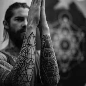 A pair of Sri Yantra embedded in other blackwork geometry by Dillion Forte (IG—dillonforte). #blackwork #DillionForte #sacredgeometry #SriYantra