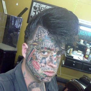 Thankfully, one occupation is always open to those who tattoo a myriad of dumb shit on their face--racist barber!  #facetattoo #barberpoll #rocknroll