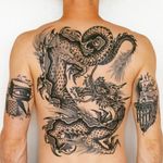 Dragon back piece tattoo by Jeff Zuck #JeffZuck #favoritetattoo #blackandgrey #dragon #creature #mythical #folklore #legend #surreal #Japanese #traditional #mashup #illustrative