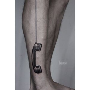 Hanging phone tattoo by Ilya Brezinski. #IlyaBrezinski #blackwork #black #tattoo #phone