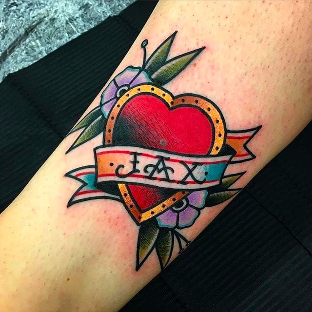 Tattoo uploaded by rcallejatattoo • Classic heart with a banner and name by  Chris Papadakis. #ChrisPapadakis #traditionaltattoo #heart #banner #name •  Tattoodo