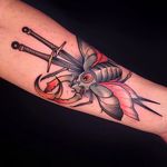 Rad scarab beetle tattoo with two swords and a crescent moon. Tattoo by Alexander Masom. #alexandermasom #scarab #swords #crescent #moon #coloredtattoo