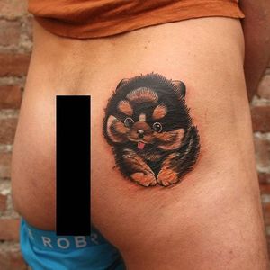 A cheeky spot for a fluffy pomeranian tattoo. Tattoo by Kim Dahlstedt. #dog #pomeranian #butt #KimDahlstedt #neotraditional