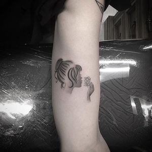 Fine line girl silhouette micro tattoo by Isaiah Negrete. #IsaiahNegrete #blackandgrey #fineline #microtattoo #blackandgrey #girl