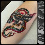 Old school eagle vs. snake tattoo. Rad work by Nick Mayes. #NickMayes #NorthSeaTattoo #traditionaltattoo #classictattoos #eagle #snake