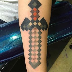 Minecraft sword tattoo by unknown artist #sword #minecraft #minecrafttattoo #gamertattoo