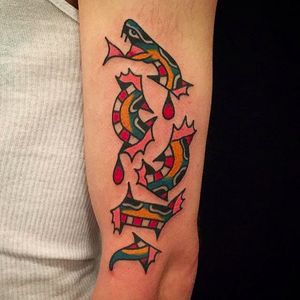 Rad snake tattoo done by Mark Cross. #MarkCross #rosetattooNYC #TraditionalTattoo #BoldTattoos #snake