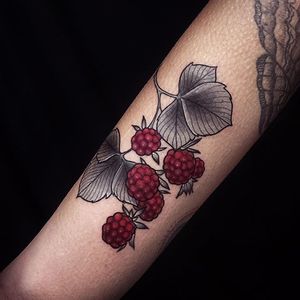 The black and grey leaves really make the red raspberries stand out. Tattoo by Alexander Masom. #raspberry #fruit #blackandgrey #AlexanderMasom #neotraditional