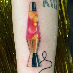 Lava lamp tattoo by Shannon Perry #ShannonPerry #besttattoos #color #realism #realistic #hyperrealism #lavalamp #60s #70s #gold #chrome #metal #goo #surreal #funky #groovy #lamp #lava #pink