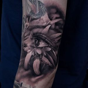 Stunning eye tattoo #BacanuBogdan #blackandgrey #realistic #eye #flower