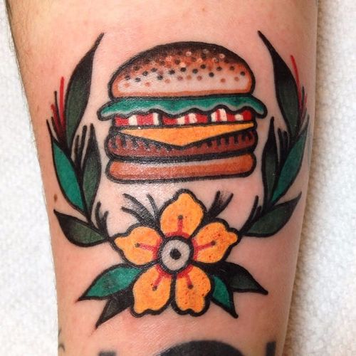 A delicious looking hamburger alongside a flow by Mike Suarez (IG— suarezism). #flower #hamburger #MikeSuarez #traditional