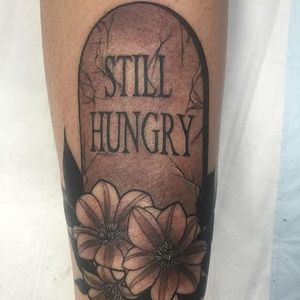 Hungry even in death. By Kaitlin Greenwood. #neotraditional #KaitlinGreenwood #gravestone #tombstone #flower #blackandgrey #hungry