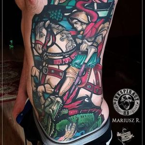 Mariusz Romanowicz's stained glass style depiction of Saint George and the Dragon (IG—mariusz_r_tattoos). #Christian #MariuszRomanowicz #SaintGeorgeandtheDragon #stainedglass