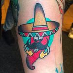 A really awesome looking chili wearing a sombrero. Magnificent tattoo by Luca Sala. #LucaSala #OldInkTattoo #boldtattoos #solidtattoos #chili #sombrero #mustache