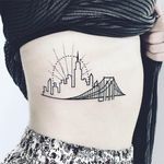 Beautiful tattoo of NYC skyline by Nothing Wild tattoo #nothingwild #nothingwildtattoo #linework #skyline #nycskyline #skylinetattoo #nycskyline #graphism #ribstattoo #graphictattoo