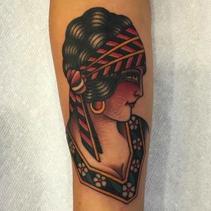 Awesome gypsy girl on forearm tattoo done by Zach Nelligan. #ZachNelligan #MainStayTattoo #traditionaltattoo #classic #gypsy #girl