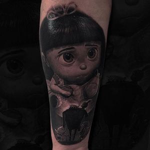 Black and grey Agnes of ‘Despicable Me’ tattoo by Owen Paulls. #OwenPaulls #blackandgrey #realism #portrait #popculture #movie #film #animation #despicableme