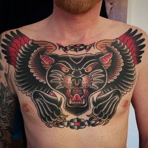 Panther, wings and chain chest piece by Dominik Dagger. #traditional #DominikDagger #panther #chains #wings