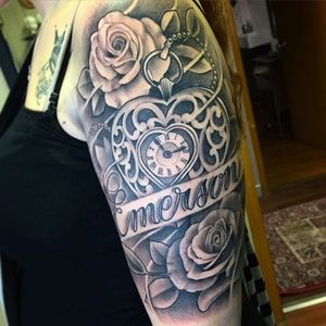 Black and grey locket and roses tattoo by Stephen McConnell. #realism #blackandgrey #StephenMcConnell #locket #flower #rose