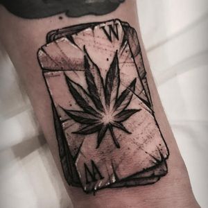 Weed in the Cards tattoo by Varo Tattooer #VaroTattooer #weedtattoos #blackandgrey #playingcards #neotraditional #darkart #illustrative #weedleaf #marijuana #stoner #cards #tattoooftheday