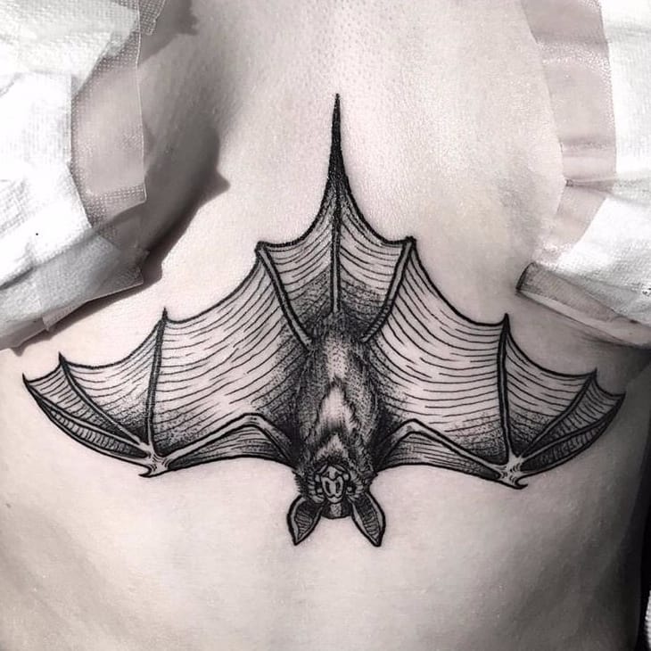 bat hanging upside down tattoo