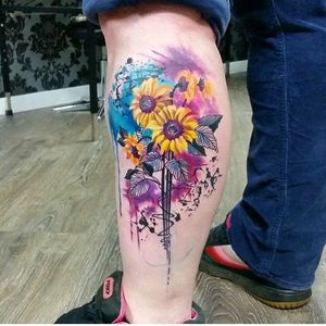 Watercolor sunflower tattoo by Beynur Kaptan. #blackandcolor #BeynurKaptan #watercolor #abstract #flower #sunflower