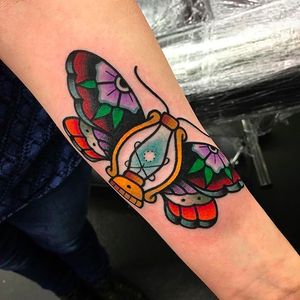 Awesome butterfly and lantern morph tattoo by Chris Papadakis. #ChrisPapadakis #traditionaltattoo #moth #lantern