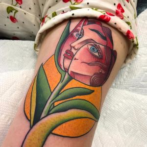 Tulip face by Shaun Topper #ShaunTopper #traditional #portrait #color #tulip #leaves #flower #floral #face #lady #sun #tattoooftheday