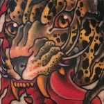 The level of detail in the jaguar by Scott Garitson (IG—scottgaritsontattoo) is jaw-dropping. #colorful #jaguar #neotraditional #ScottGaritson