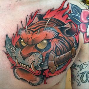 Awesome bold color tiger tattoo from David Tevenal #DavidTevenal #tiger #newjapanese #newschool #dagger