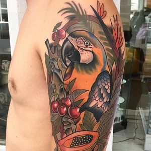 Brightly colored parrot and fruit, by Roger Mares. (via IG—mares_tattooist) #neotraditional #animals #creatures #quirky #rogermares